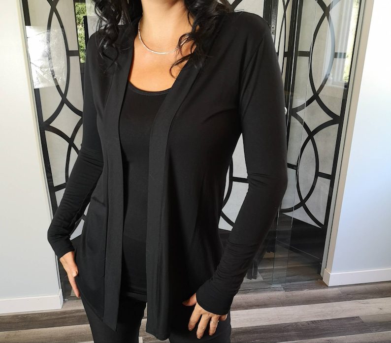 Black long-sleeve cardigan, rayon blend.