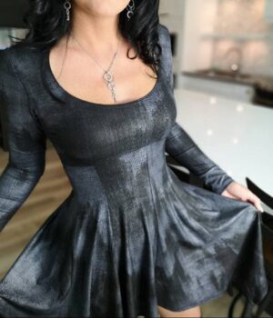 Metallic black long-sleeve low-cut neckline tissue hem dress.