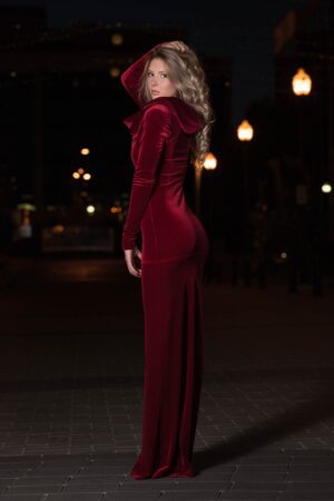 Red velvet hooded long-sleeve dress.
