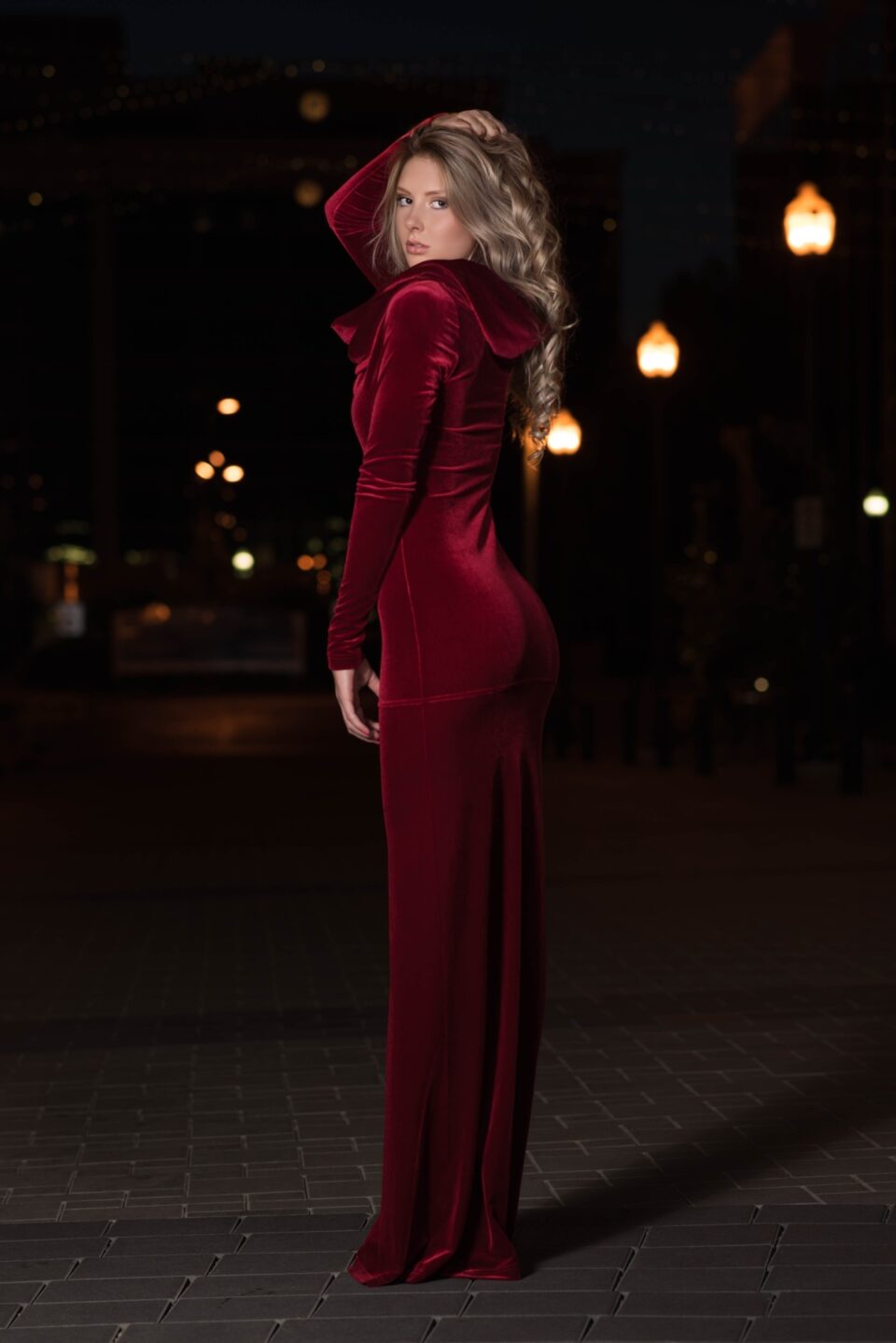 Red velvet hooded long-sleeve dress.
