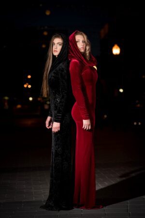 Black velvet hooded long-sleeve dress.