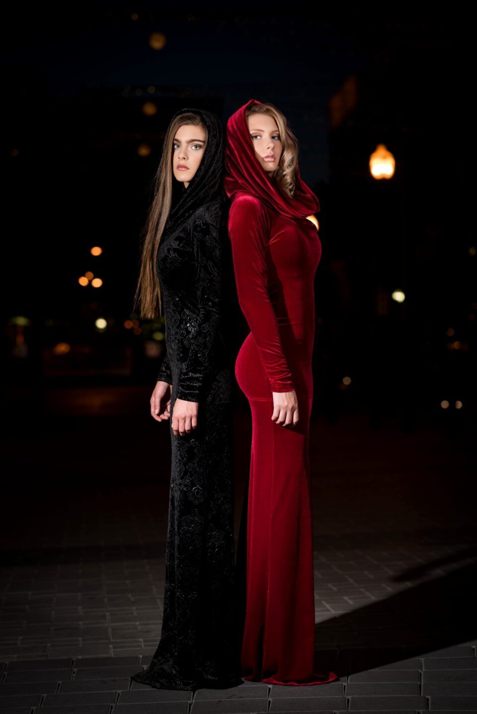 Black velvet hooded long-sleeve dress.