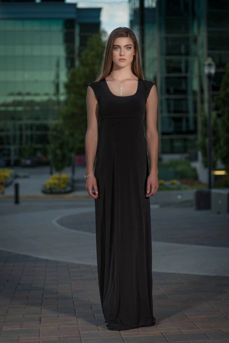 Black cap sleeve fitted maxi dress.