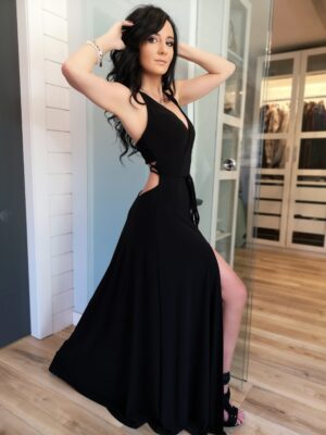 Black maxi dress with open back and front slit.