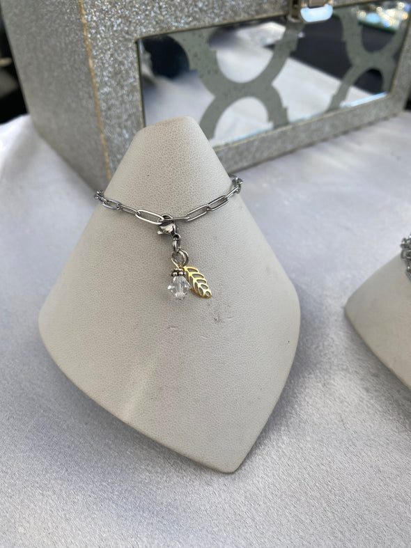 Silver gold and clear crystal stunning sims bracelet.