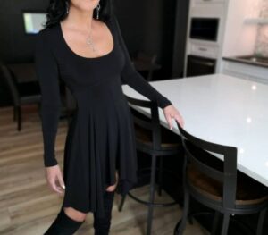 Black tissue hem asymmetrical long-sleeve dress.