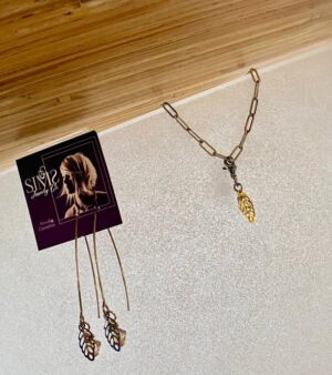 Silver sims earrings with leaf charm.