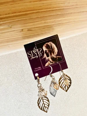 Sims jewelry leaf pendant with matching earrings.