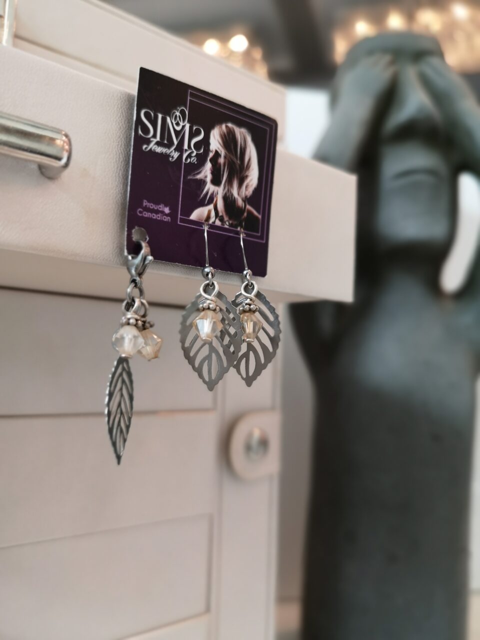Leaf and crystals pendant with matching earrings.