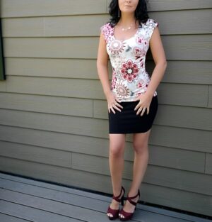 Red on ivory cap sleeve floral top.