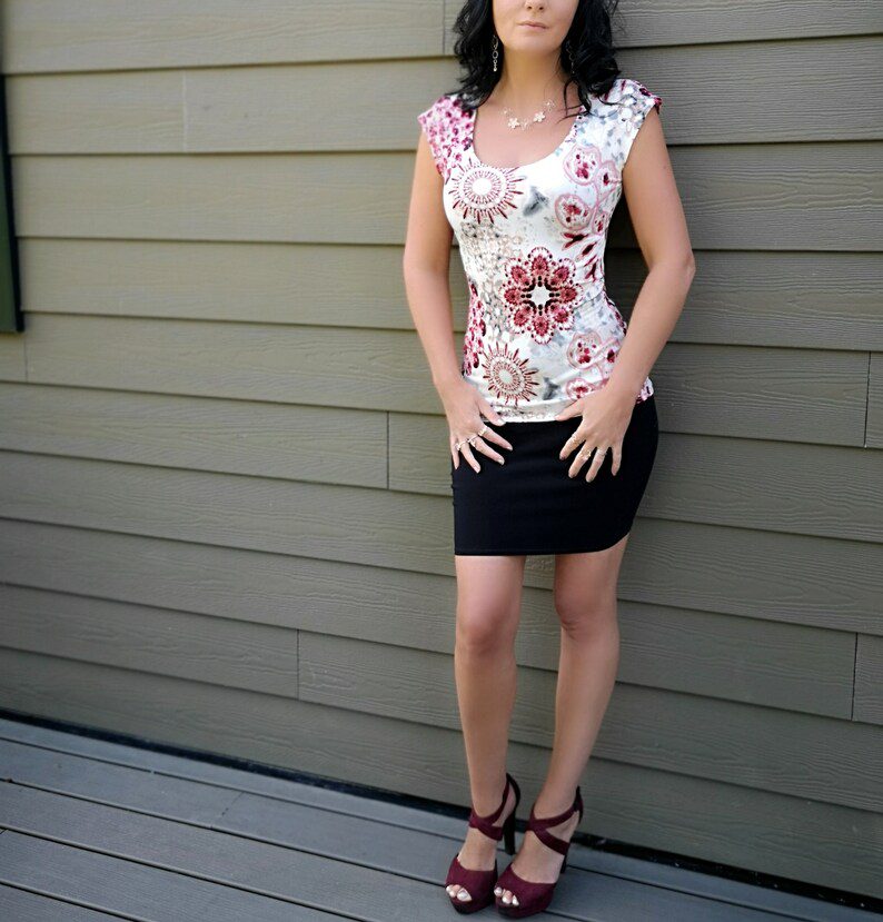 Red on ivory cap sleeve floral top.