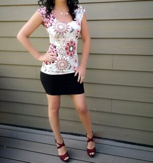 Red on ivory cap sleeve floral top.