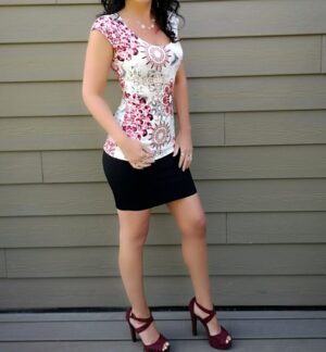 Red on ivory cap sleeve floral top.