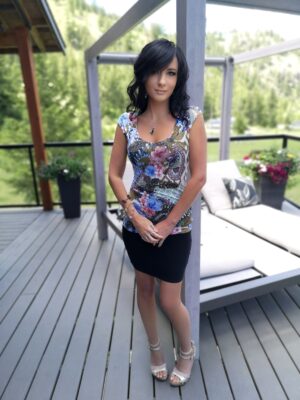 Blue and pink cap sleeve tropical print top.
