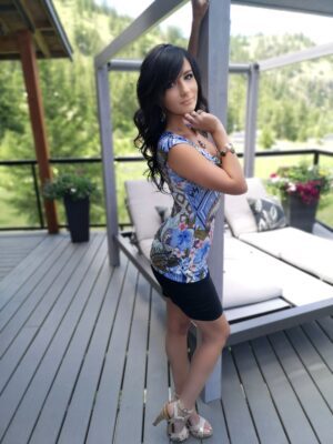 Blue and pink cap sleeve tropical print top.