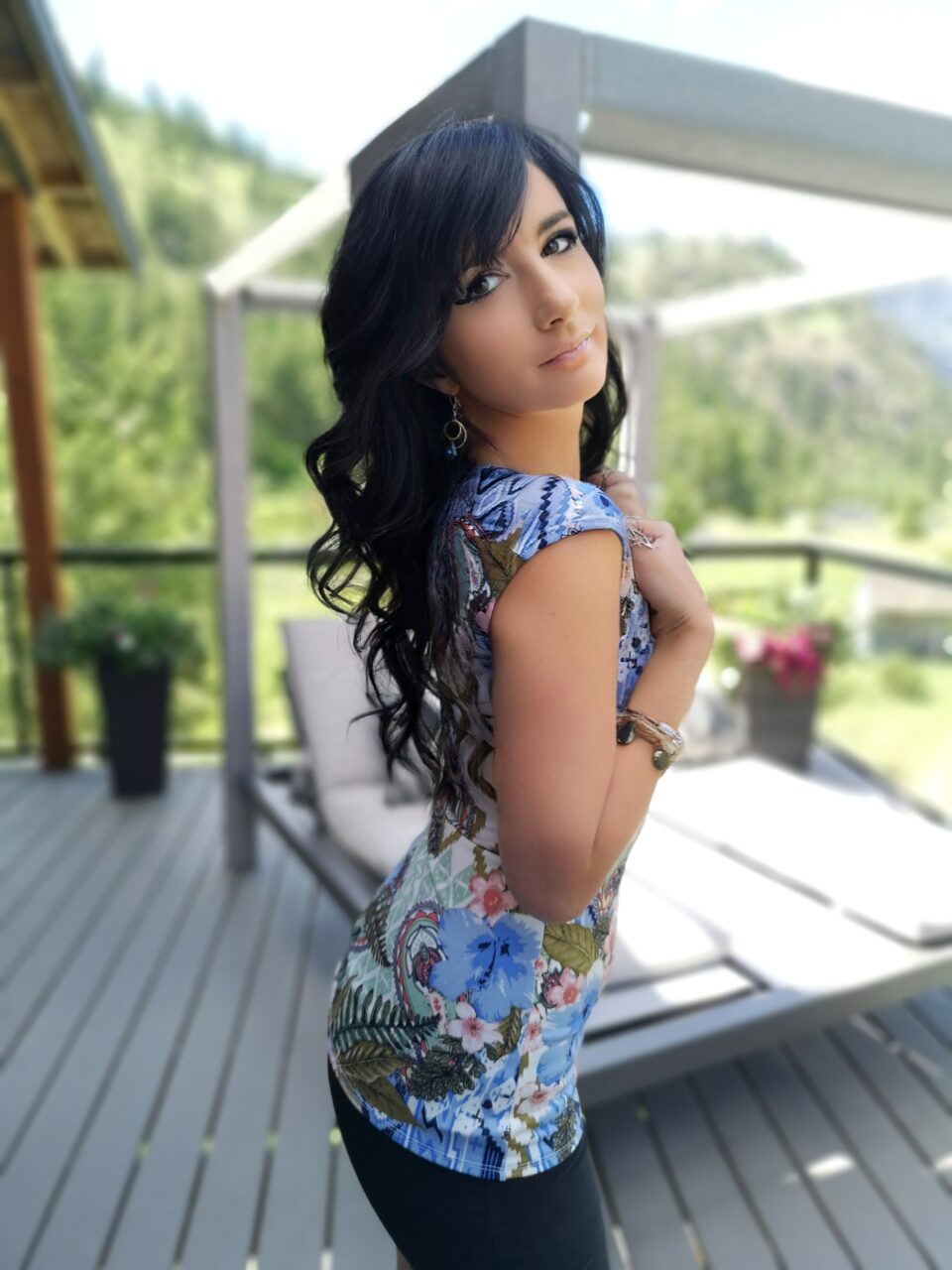 Blue and pink cap sleeve tropical print top.