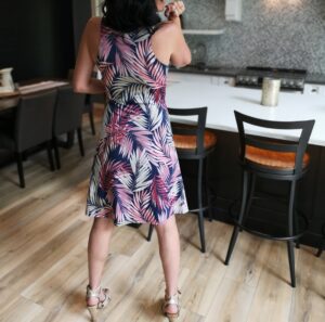 Mauve and white on navy stunning sleeveless tropical print dress.