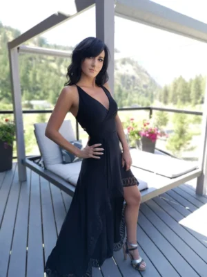 Black backless maxi dress with lace trim.