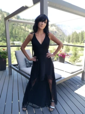 Black backless maxi dress with lace trim.