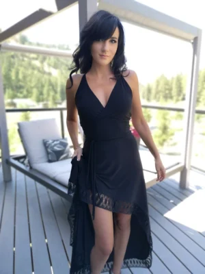 Black backless maxi dress with lace trim.