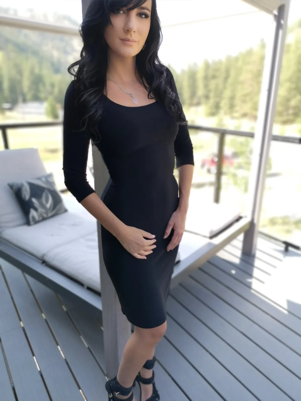 Fitted black dress.