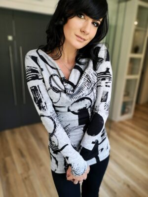 Gray and black cowl neck long-sleeve fitted top.