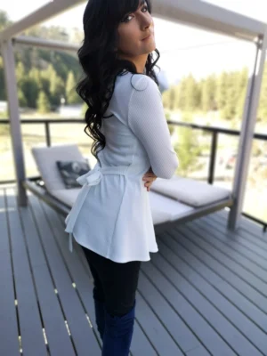 Ivory fitted but flowy cardigan.