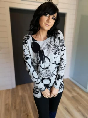 Black and gray print long sleeve slouchy yet fitted in the hips and arms tunic top.