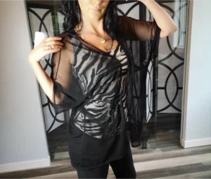 Black mesh cover up light jacket.
