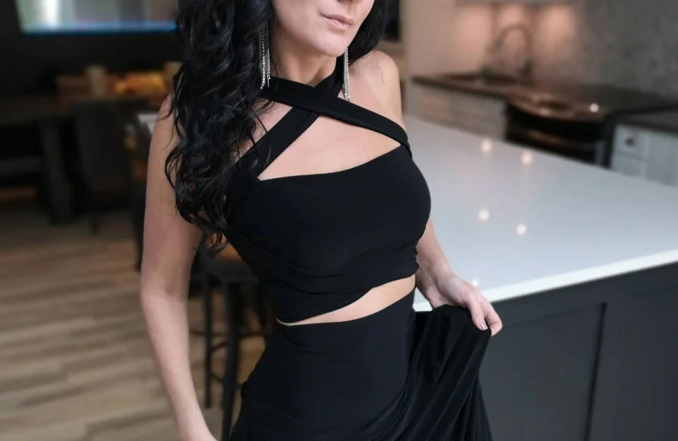 Black crop top tube top with two long, versatile ties.