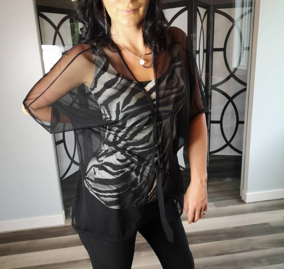 Black mesh cover up light jacket.
