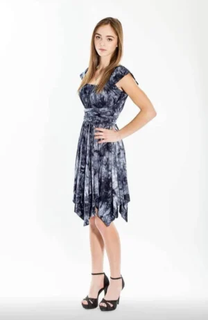 Deep blue and white tie-dye sundress with cap sleeve, elastic gathers, and two long waist ties.