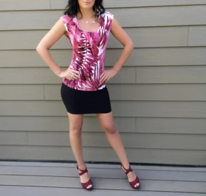 Pink tropical print, cap sleeve, round neck fitted top.