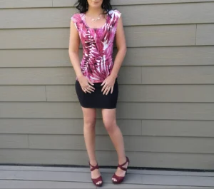 Pink tropical print, cap sleeve, round neck fitted top.