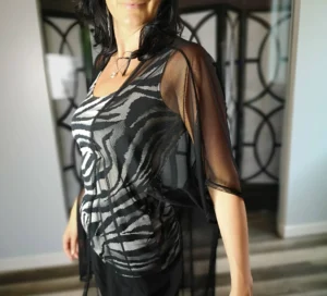 Black mesh cover up light jacket.
