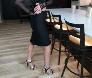 Beautiful fitted black pencil skirt with slit.
