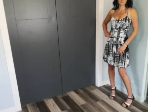 Cute little summer dress in neutral black and white abstract stripey print.