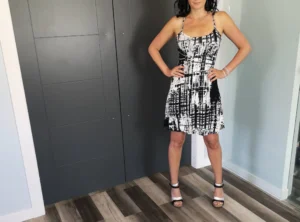 Cute little summer dress in neutral black and white abstract stripey print.