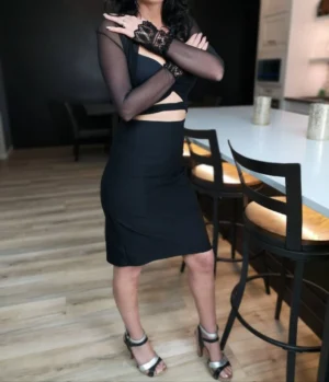 Beautiful fitted black pencil skirt with slit.