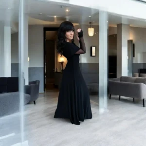 Black, Fitted, hooded, cowl neck, maxi dress with mesh sleeves and finger cut outs.