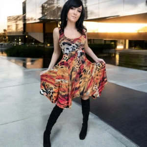 Sleeveless orange, black and yellow animal print tissue hem round neck mini dress.