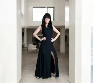 Double-slitted black bamboo maxi dress with versatile oversized hood.