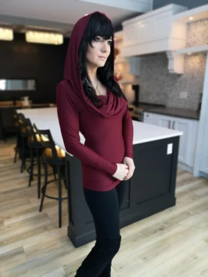 Burgundy red long-sleeve fitted hooded top in soft, sustainable bamboo. Besides being worn up or down, the hood can be draped down your bust to amplify the cowl neck, or worn off the shoulders.