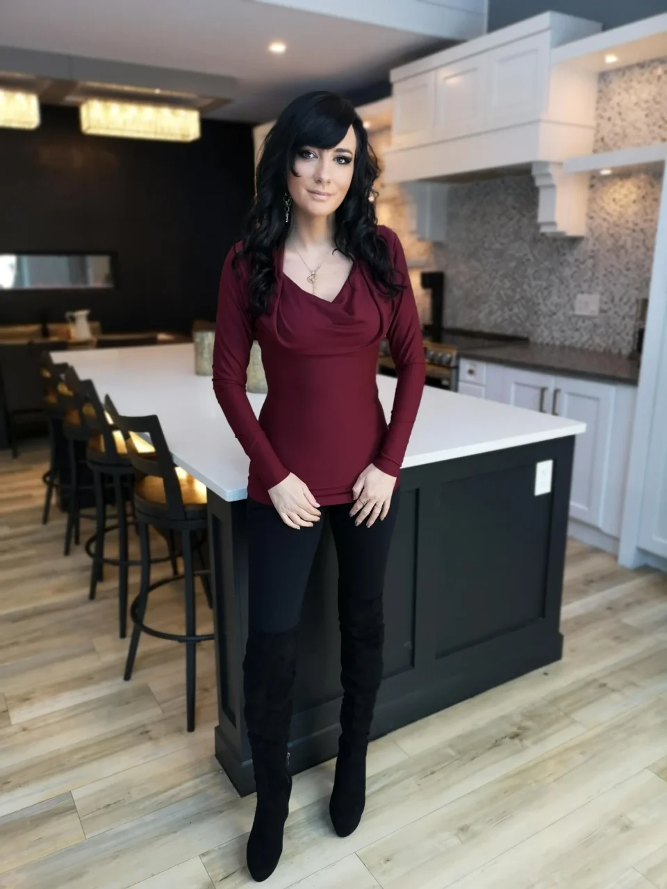 Burgundy red long-sleeve fitted hooded top in soft, sustainable bamboo. Besides being worn up or down, the hood can be draped down your bust to amplify the cowl neck, or worn off the shoulders.