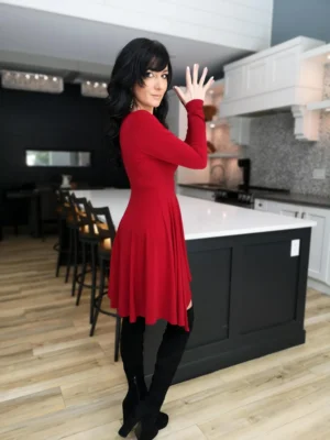 Short red long-sleeve tissue hem dress.