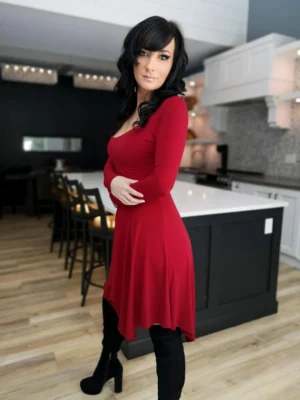 Short red long-sleeve tissue hem dress.
