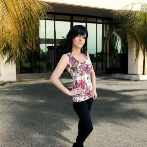 White pink black floral print sleeveless fitted top.