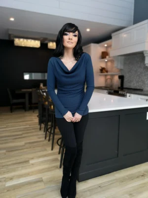 Blue ribbed cowl neck long-sleeve top.