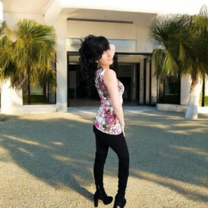 White pink black floral print sleeveless fitted top.