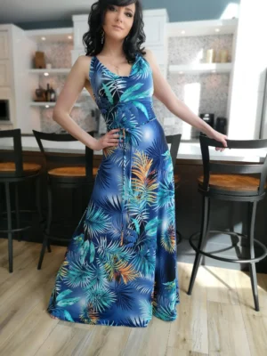 Cowl neck open back blue moonburst tropical print maxi dress.